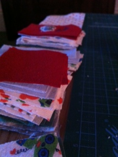 Baby clothes all cut up and ready for use.